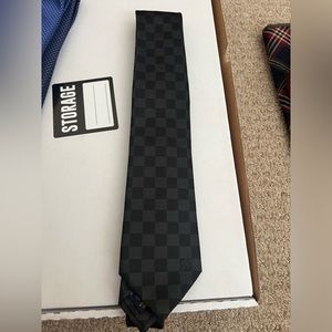 Louis Vuitton tie.